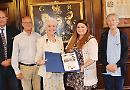Decorative parchment celebrates twin towns