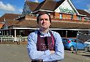 Shop worker axed for online posts