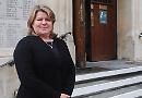 Town manager to stay despite cut in funding by district council