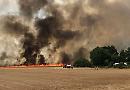 Homes evacuated as inferno destroys farmland 
