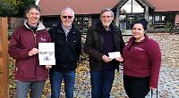 Regatta presents £3,500 to charity
