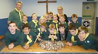 Cubs give 16 parcels to food bank after coin collection