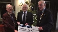 Rotary club presents £1,000 to RNLI for Christmas