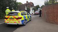 Woman arrested after cyclist dies in crash