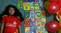 Girl reads book a day for charity in memory of her gran