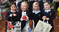 Pupils race pigs and throw snowballs at Christmas fair