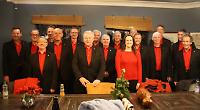 Living Advent Calendar Day 21: A gleaming river backdrop for a capella group at Leander