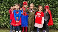 Comic Relief: schoolchildren (and teachers) wear fancy dress and put on red noses