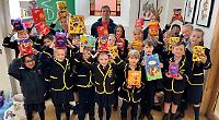 Pupils deliver 130 Easter eggs to Nomad food bank