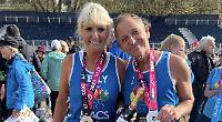 Charity runners finish London Marathon despite pain and rain