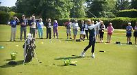 Golf pro offers tips at charity day