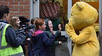Pudsey dances and hugs children during school visit