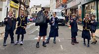 Pupils go litter picking while street is shut for repairs