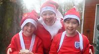 Storming Santas defy strong winds for running fundraiser