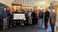 Golfers raise £5,800 for charity