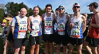 Runners keep their cool as hot weather brings out the crowds