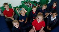 Children from Heights Primary School deliver supplies to foodbanks