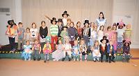 Children dress up for Alice in Wonderland themed party