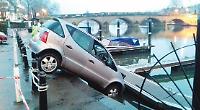 Elderly woman rescued after accidentally driving into river