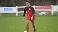 Spruyt and Mayberry on target as 10-man Town triumph on travels