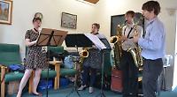 Jazz quartet perform for pensioners at charitable concert