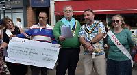 Singing and baking raise £600 for disabled charity