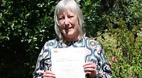 Woman achieves highest award for playing piano