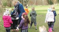 Children clean up and learm