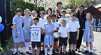 Pupils treat locals to tea party