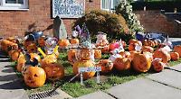 Pupils decorate pumpkins for Halloween disco night