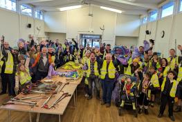 Baby joins village spring cleaners