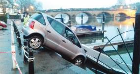 Elderly woman rescued after accidentally driving into river