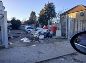 Residents hit out at 'eyesore' rubbish pile behind Slough flats