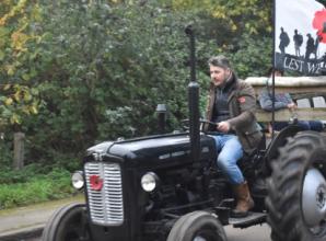 Tractors take people to farm service