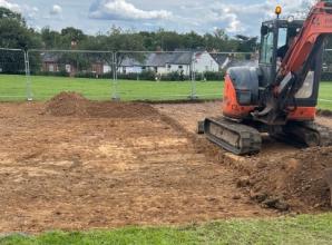 By George! Work begins on new basketball half-court