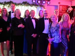 Rugby dinner with singer raises £5,000 for club