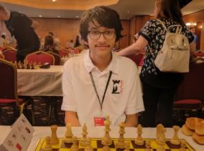 Chess boy climbs world ranking at youth contest