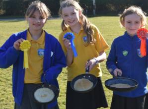 Pancake race returns in sunshine