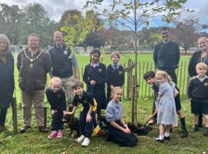 School plants two trees for 100th birthday