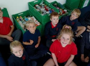 Children from Heights Primary School deliver supplies to foodbanks
