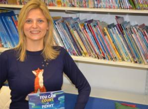 Financier writes children’s book with message to follow dreams