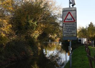 Drivers warned after car gets stuck in water at Charvil's Land's End Ford