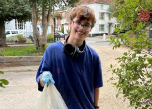 Student who cleans up on woodland and river walks
