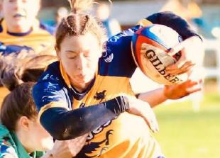 Mueller bows out with late score as Hawks triumph