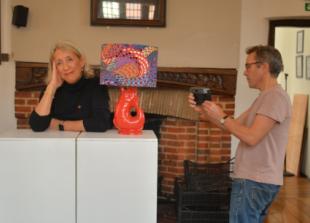 Artist puts heads together as ‘spine’ project takes shape