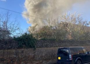 Six fire crews battle house blaze close to church