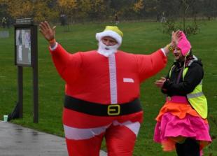 Santas take on Sunday stroll