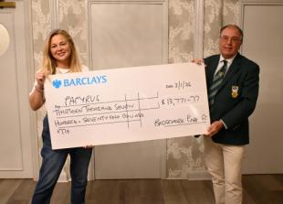 Golf club captain raises thousands to keep suicide prevention hotline