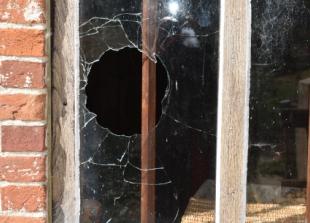 Swimming vandals smash windows at historic mill