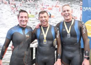 Team-mates take top three places at club to pub swim